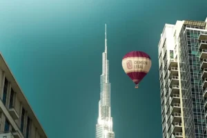 Crimson Legal balloon near Burj Khalifa illustrates Steps for Business Structuring in Full Compliance with UAE Corporate Laws in Dubai.