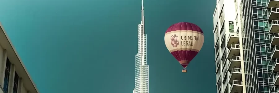 Crimson Legal balloon near Burj Khalifa illustrates Steps for Business Structuring in Full Compliance with UAE Corporate Laws in Dubai.